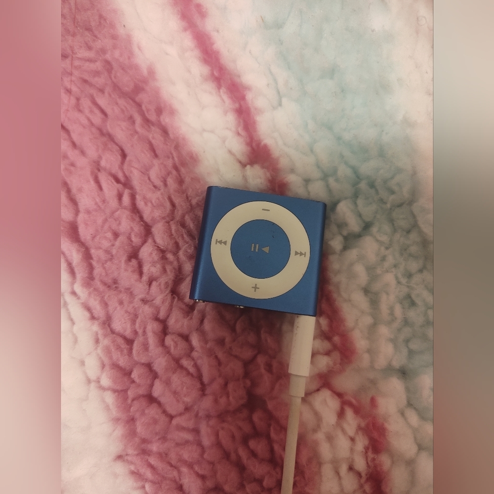Blue iPod shuffle with charger